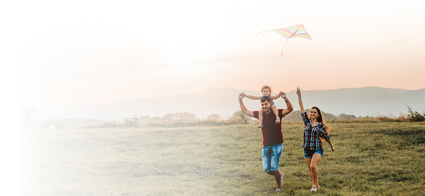 family flying kite