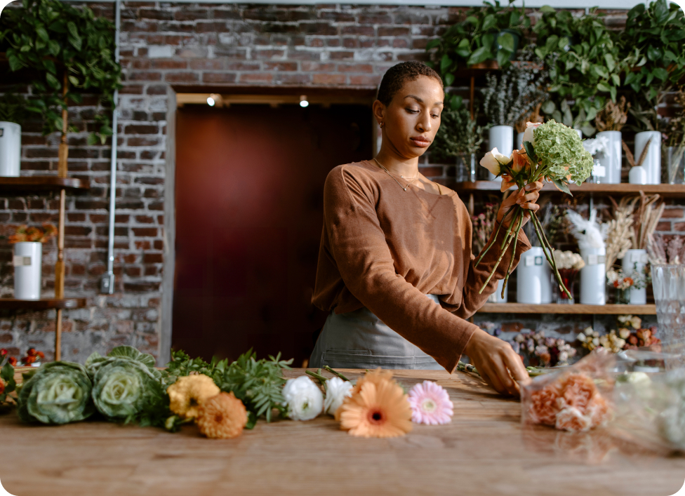 Florist arranging flowers